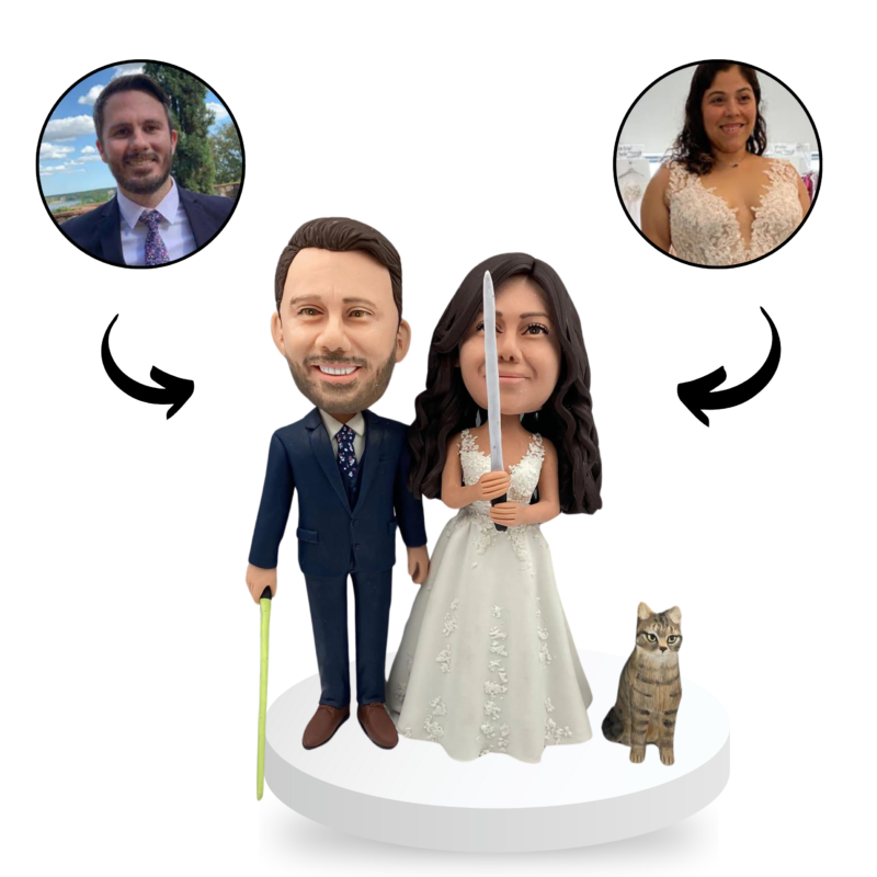 couple with cat wedding cake topper